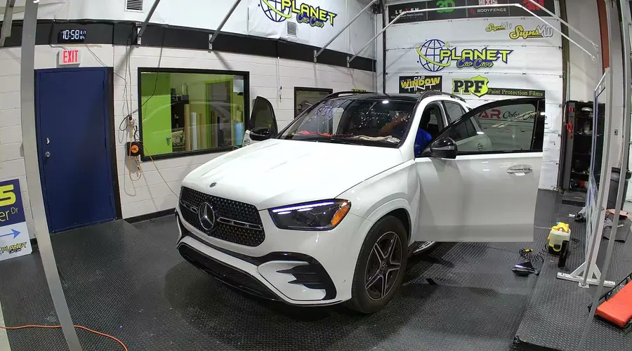 Tint being trimmed to the edge of the window