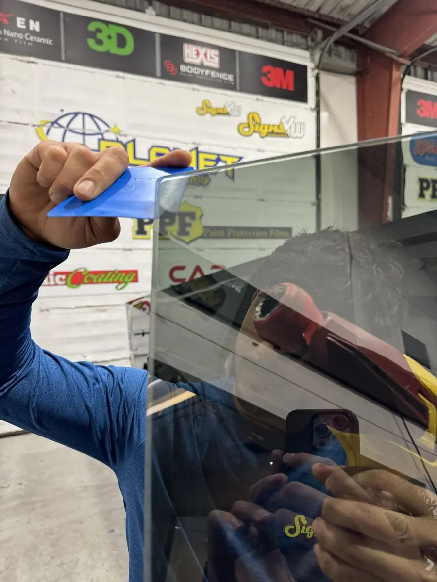 Vertical view of a tinted vehicle window
